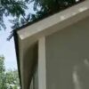 Installed Meridian 8 ft. x 10 ft. Wood Storage Shed with Autumn Brown Shingles - Image 6